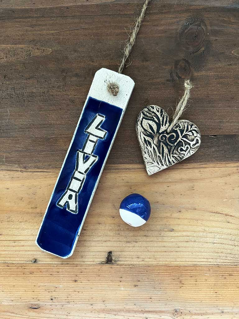 Türschild - Hier wohnen